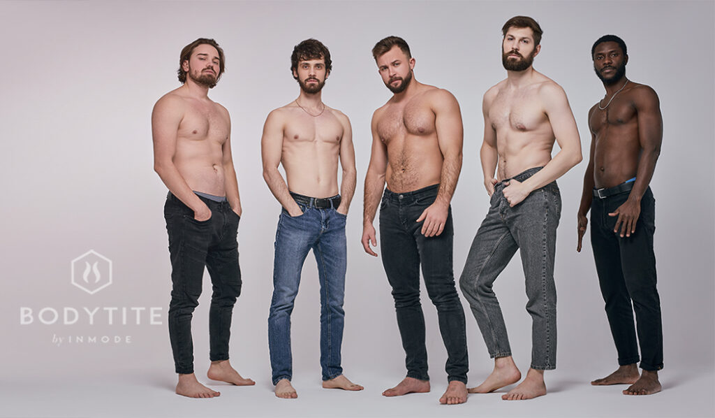 Confident fit guys with naked torso posing together, having serious look